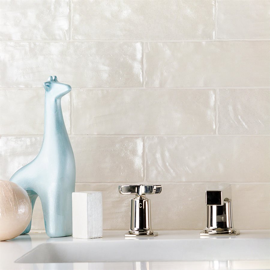 What is the shape of the tiles in the Mallorca 2x8 Cream collection?