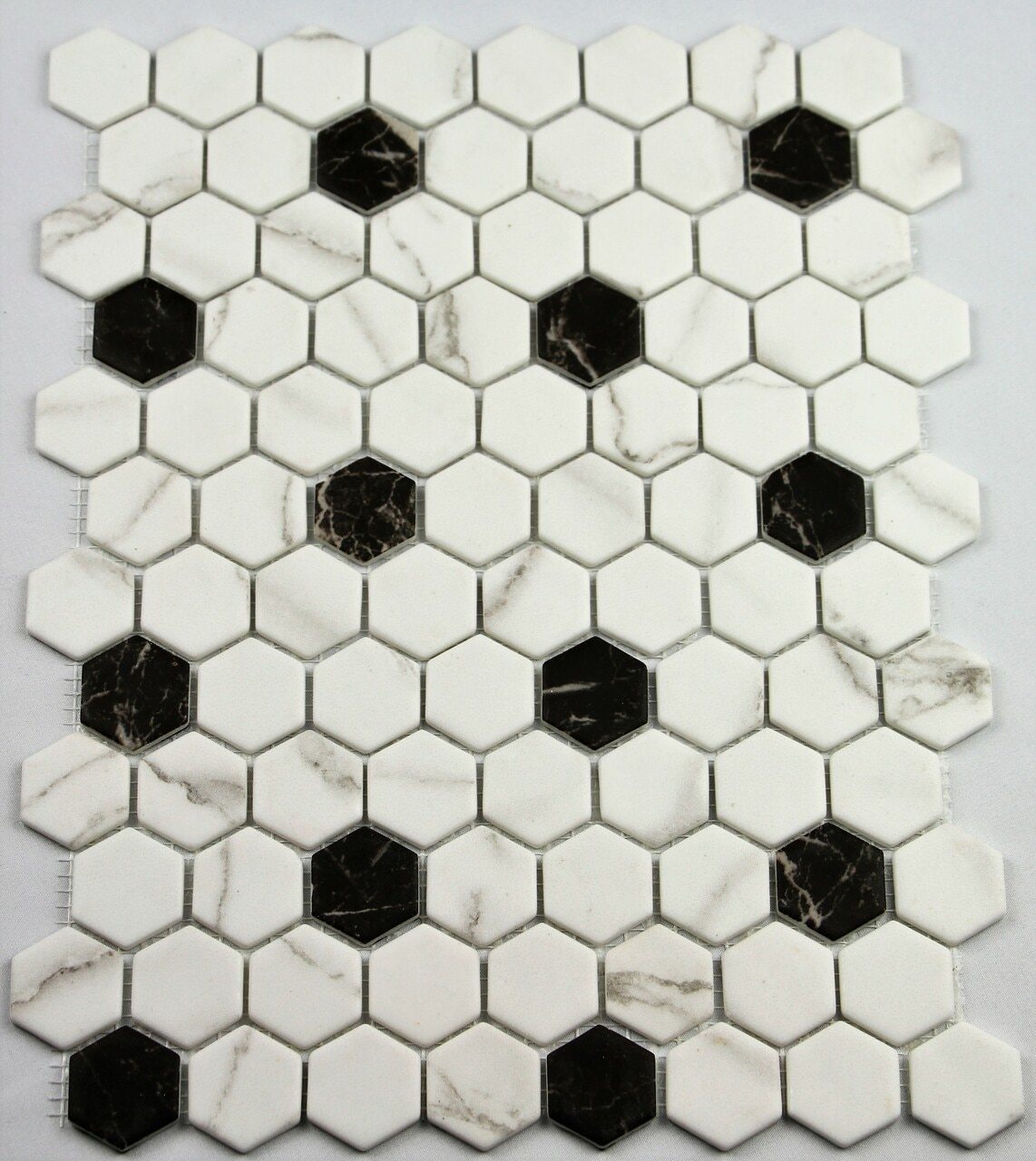 Does the black and white hexagon tile have a high recycled content percentage?